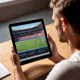 社区活跃用户头像，正在使用平板浏览赛事资讯